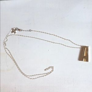 A block letter necklace